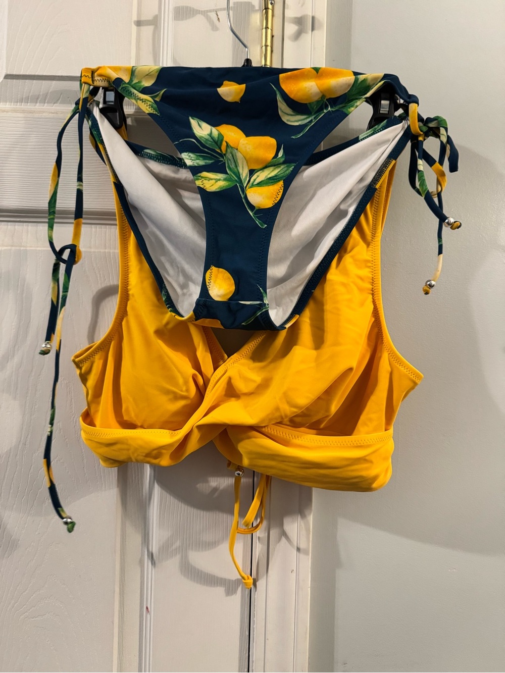 Cupshe Yellow Twist Sports Bikini Top with Navy Lemon-Print Tie-Side Bottoms